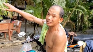 The man saws a very tall Dipterocarpus alatus tree [upl. by Kcinnay]