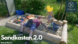 Sandkasten aus Baumstämmen bauen [upl. by Ehcor287]