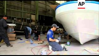 Rebuilding Japans fishing fleet post tsunami [upl. by Lerrehs]