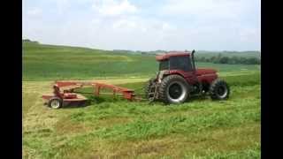 Case IH Magnum 7120 tractor and Case IH 8312 disc windrower [upl. by Britte938]