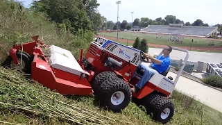 Mowing Thick Brush on a Steep Slope with a Ventrac [upl. by Aserej]