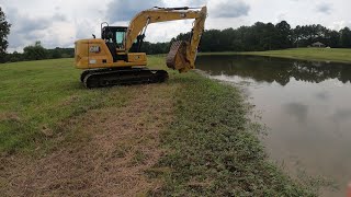 Dredging and raising the banks of a pond [upl. by Jemima]