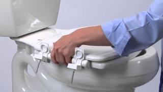 How to Install Toilet Seat  Easy•Clean amp Change™ with STATITE® Seat Fastening System™ Flip Cap [upl. by Drwde]