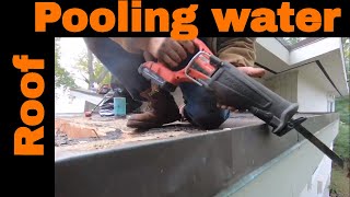 How to remove standing water quick and easy via a channel the best way to save a roof from leaking [upl. by Pleasant]