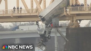 Louisville firefighters rescue driver from truck dangling off bridge [upl. by Iznyl]