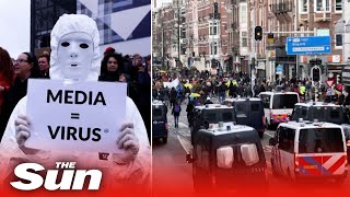 Thousands of antilockdown protesters march in Amsterdam [upl. by Puduns]