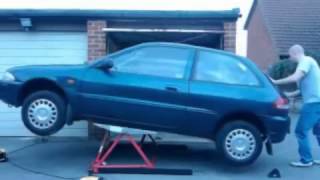 MINI TILTING CAR LIFT CL03 SUPPLIED BY CJ AUTOS [upl. by Aleb]