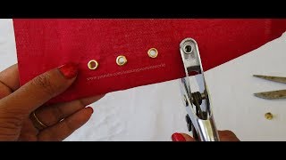 How to Insert an Eyelet in Fabric [upl. by Aelahc954]