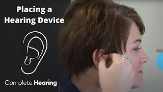 How to place a hearing device in the ear [upl. by Anitnamaid]