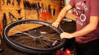 How to Put on New Bike Tire amp Tube  Bicycle Repair [upl. by Noraf]