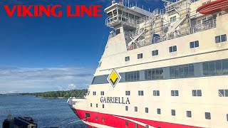 A passenger ferry passes between islands flying over the deck Viking Line Gabriella [upl. by Oicnanev]