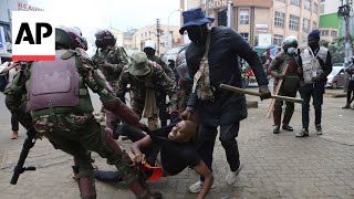 Police hurl tear gas at protesters in Kenya as Cabinet ministers are sworn in [upl. by Annaor412]