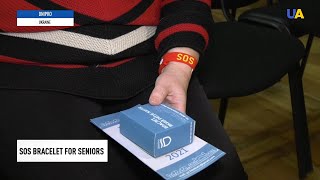 SOS bracelets for seniors distributed in Dnipro city [upl. by Elleynod]