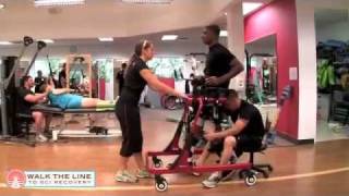 Lee T12 paraplegic recovering from spinal cord injury using Rifton Pacer gait trainer July 2011 [upl. by Cline890]