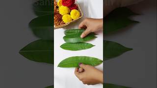 Mango leaf decoration Pooja backdrop thoranam Dussehra Pooja decoration with mango leaves flowers [upl. by Sulienroc]