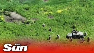 Incredible video shows Ukrainian soldiers in Humvees storming Russian trenches [upl. by Armitage308]