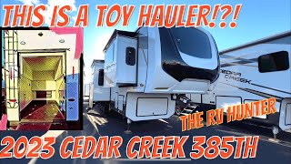 2023 Cedar Creek 385TH  Toy Hauler 5th Wheel Hybrid  New 2023 Decor [upl. by Aiam]