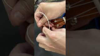 How to string a ukulele using the lock in method ukulele restringtutorial ukulelerestring [upl. by Oirasan]