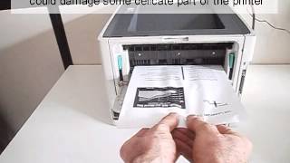 How to fix a printer paper jam [upl. by Neelcaj]