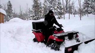 ATV Plowing 3 Feet of Snow Kawasaki Prairie 400 [upl. by Pedaiah]