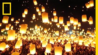 Watch as Lanterns Fill the Sky in Thailand  National Geographic [upl. by Yrrek]