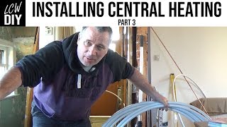 How to Install Central Heating System part 3  running pipes under the floorboards DIY Vlog 12 [upl. by Einnep]