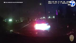 LAPD bodycam video shows suspect armed with machine gun firing at 2 officers during traffic stop [upl. by Hillyer]