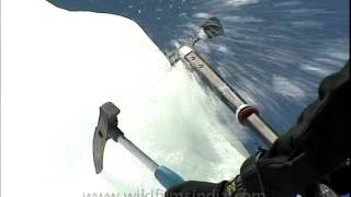 Everest climbers use hammer pitons on a steep slope [upl. by Holly-Anne]