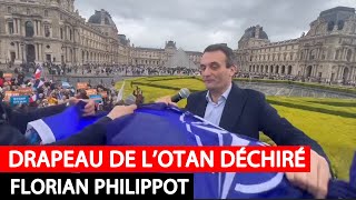 Florian Philippot déchire le drapeau de lOTAN [upl. by Gnehp]