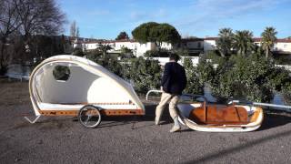 Fliptail folding sailing dinghy fits inside the Foldavan folding bicycle caravan [upl. by Sidnac]