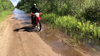 Honda CRF250L going through nature’s automatic car wash [upl. by Allbee]