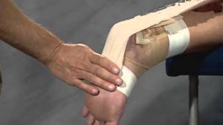 Protect a strained or sprained Achilles tendon with athletic taping [upl. by Sirronal]