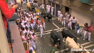 Running of the bulls in Spains Pamplona begins [upl. by Antonietta]