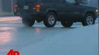 Raw Video Icy Road Has Drivers Sliding [upl. by Ahsoem135]