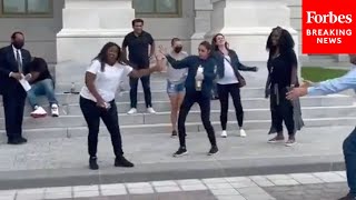 Viral Moment AOC And Cori Bush Dance Outside Capitol During Eviction Moratorium Protest [upl. by Staw589]