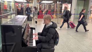 The most Insane Interstellar cover on a train station public piano [upl. by Ieso799]