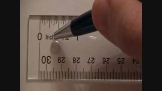 Measuring Lines in Inches and Half Inches with a Ruler Revised [upl. by Gunilla]