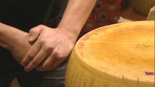 Cracking a Wheel of Parmigiano Reggiano  Cheese  Whole Foods Market [upl. by Adnorahc]