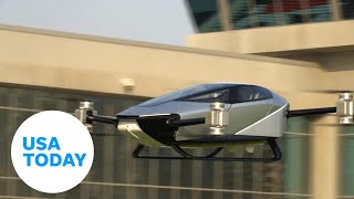 Chinese company launches electric flying taxi at Dubai tech show  USA TODAY [upl. by Damal279]