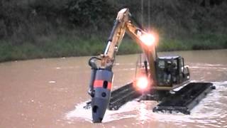 Bell Dredging Pumps  Amphibious excavator [upl. by Grissom]