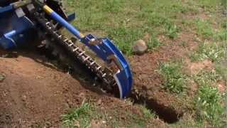 Auger Torque MT900 Trencher on Kubota SVL75 [upl. by Enneibaf]