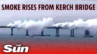 Russia Ukraine War Smoke rises over Kerch Bridge linking Crimea and Russia [upl. by Ettenirt]