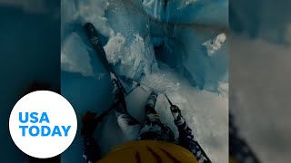 Scary moment a skier falls down the crevasse in French Alps  USA TODAY [upl. by Akimal600]