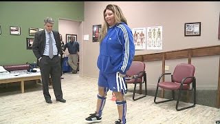 Paralyzed woman takes first steps with help of special brace [upl. by Ennagem]