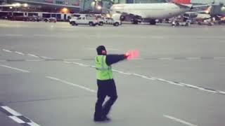 Ramp agent dancing on early morning at Toronto Airport [upl. by Backler85]