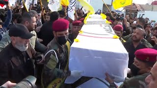 Iraqs Kataib Hezbollah group mourns fighter killed in US strike [upl. by Ledairam]