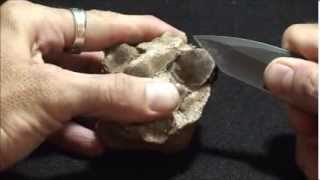 Demonstration of mineral cleavage using a muscovite mica crystal [upl. by Rehc]