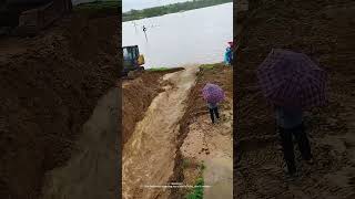 Use An Excavator To Dig Open The Reservoir To Release Flood Waters After Downpour [upl. by Farra]