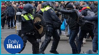 Protests in Europe Police in Amsterdam clash with antilockdown protesters [upl. by Asillam]