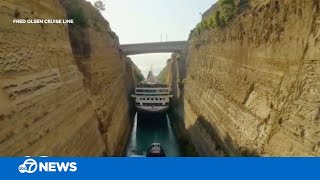 Cruise ship makes tight squeeze through canal [upl. by Eceinal]